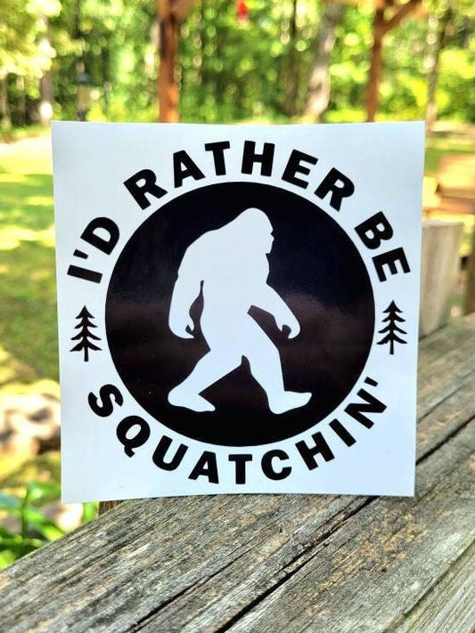 BigFoot Sasquatch I'd Rather Be Squatchin Vinyl Decal Sticker for Car Truck Cup Laptop RV Camper Van in several colors and sizes.